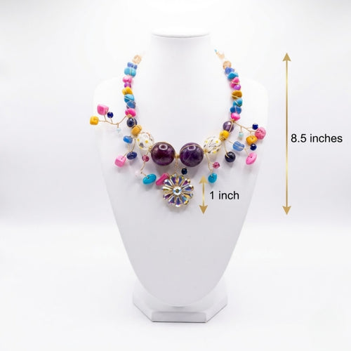 Luxury handmade colourful beaded statement necklace with floral crystal pendant handcrafted in Ghana by Duchess Beads.
