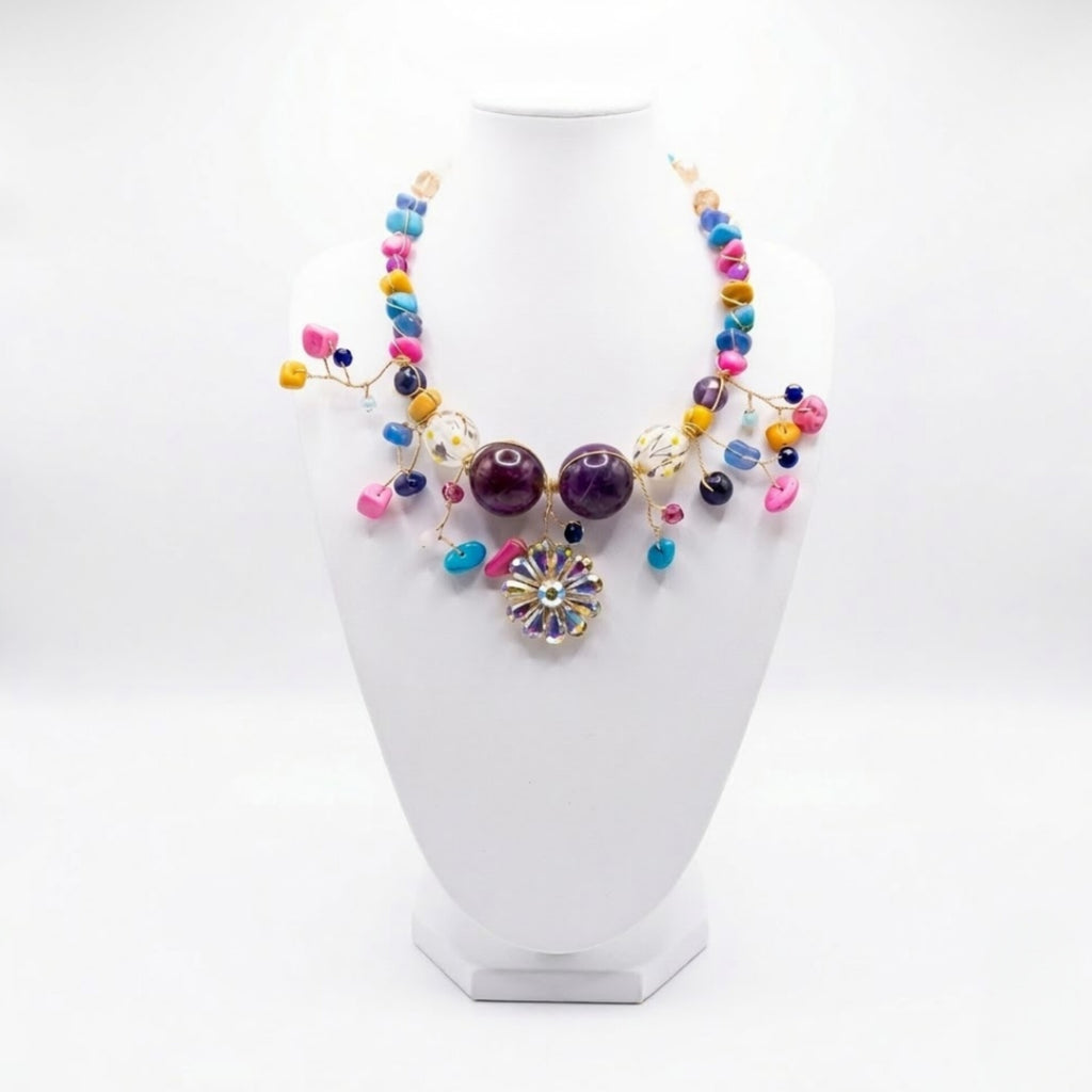 Luxury handmade colourful beaded statement necklace with floral crystal pendant handcrafted in Ghana by Duchess Beads.
