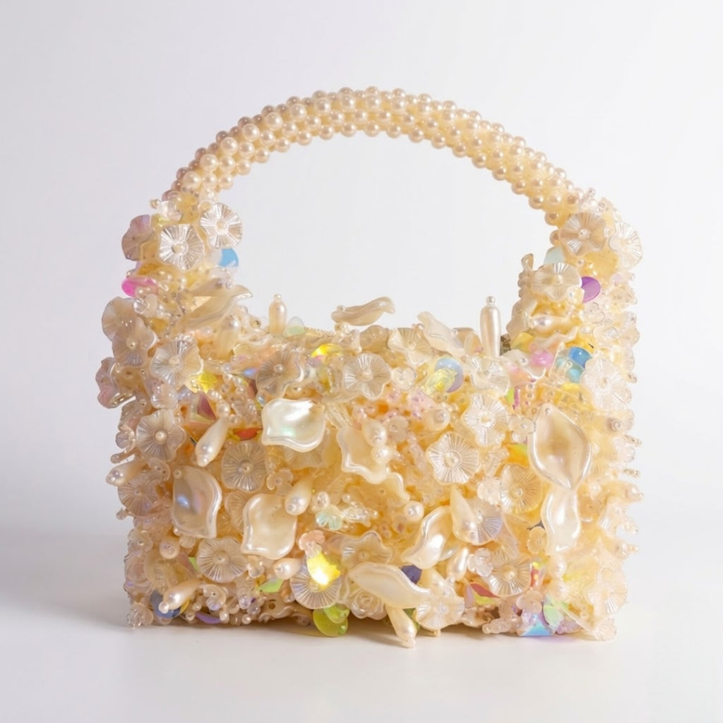 Luxury handmade pearl beaded mini handbag with floral embellishments and pearl handle handcrafted in Ghana by Duchess Beads.