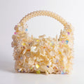 Luxury handmade pearl beaded mini handbag with floral embellishments and pearl handle handcrafted in Ghana by Duchess Beads.